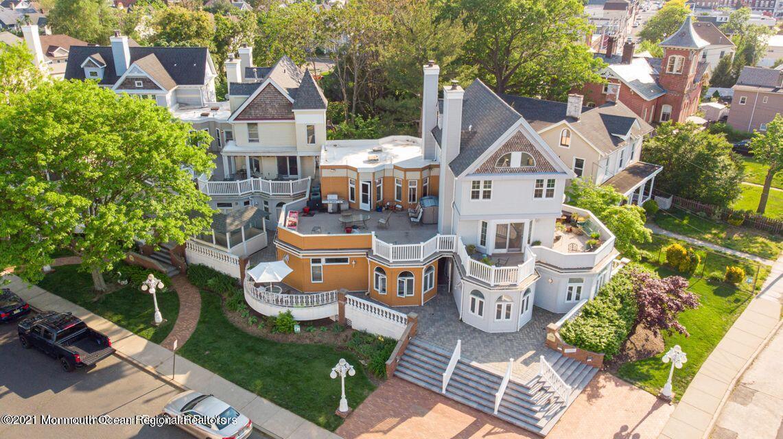 100 1st Street, Unit 5 Keyport, NJ 07735 - Photo 3 of 18 a front view of a house with garden