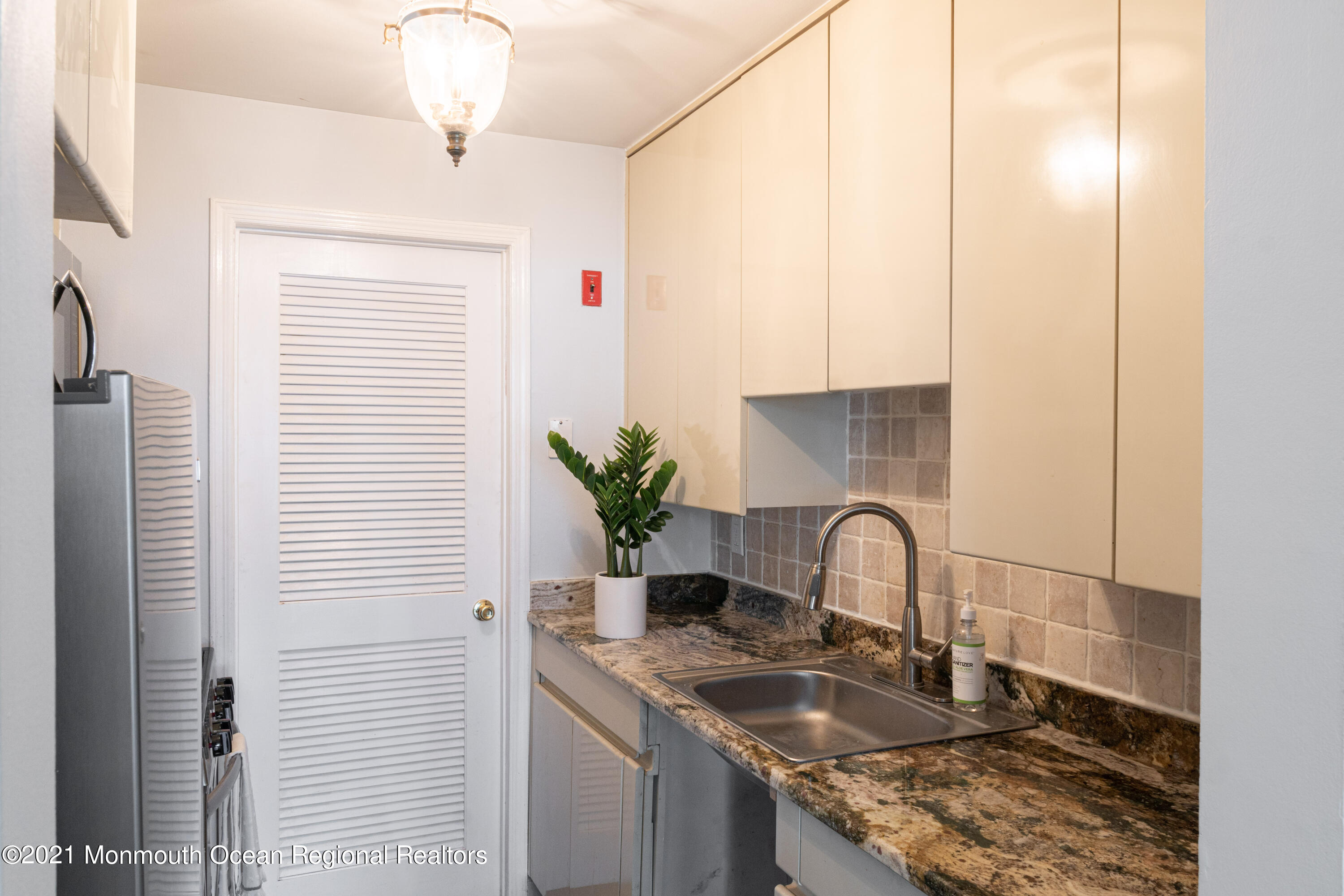 100 1st Street, Unit 5 Keyport, NJ 07735 - Photo 5 of 18 a kitchen with a sink and a window