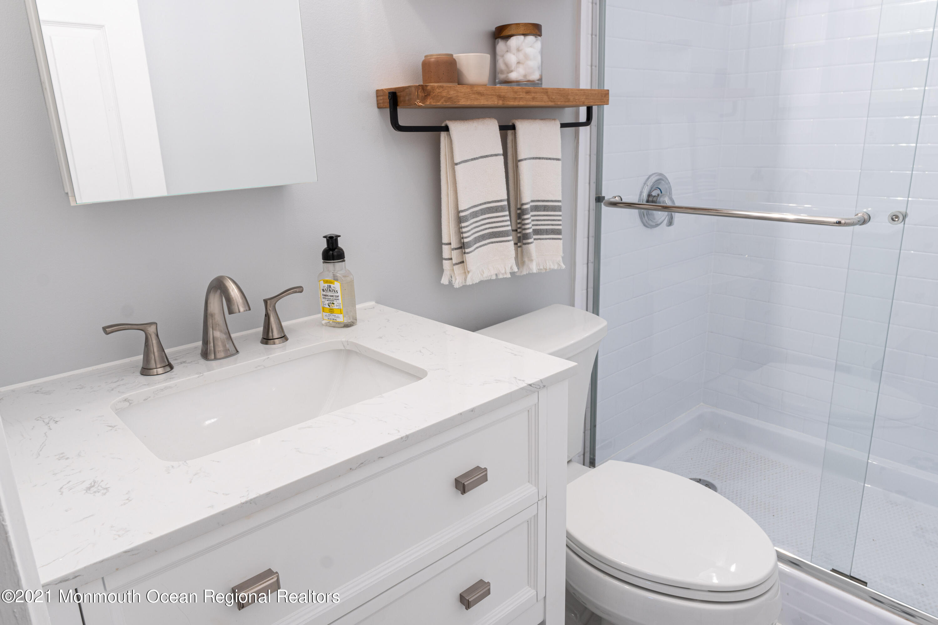 100 1st Street, Unit 5 Keyport, NJ 07735 - Photo 8 of 18 a bathroom with a sink a toilet and shower