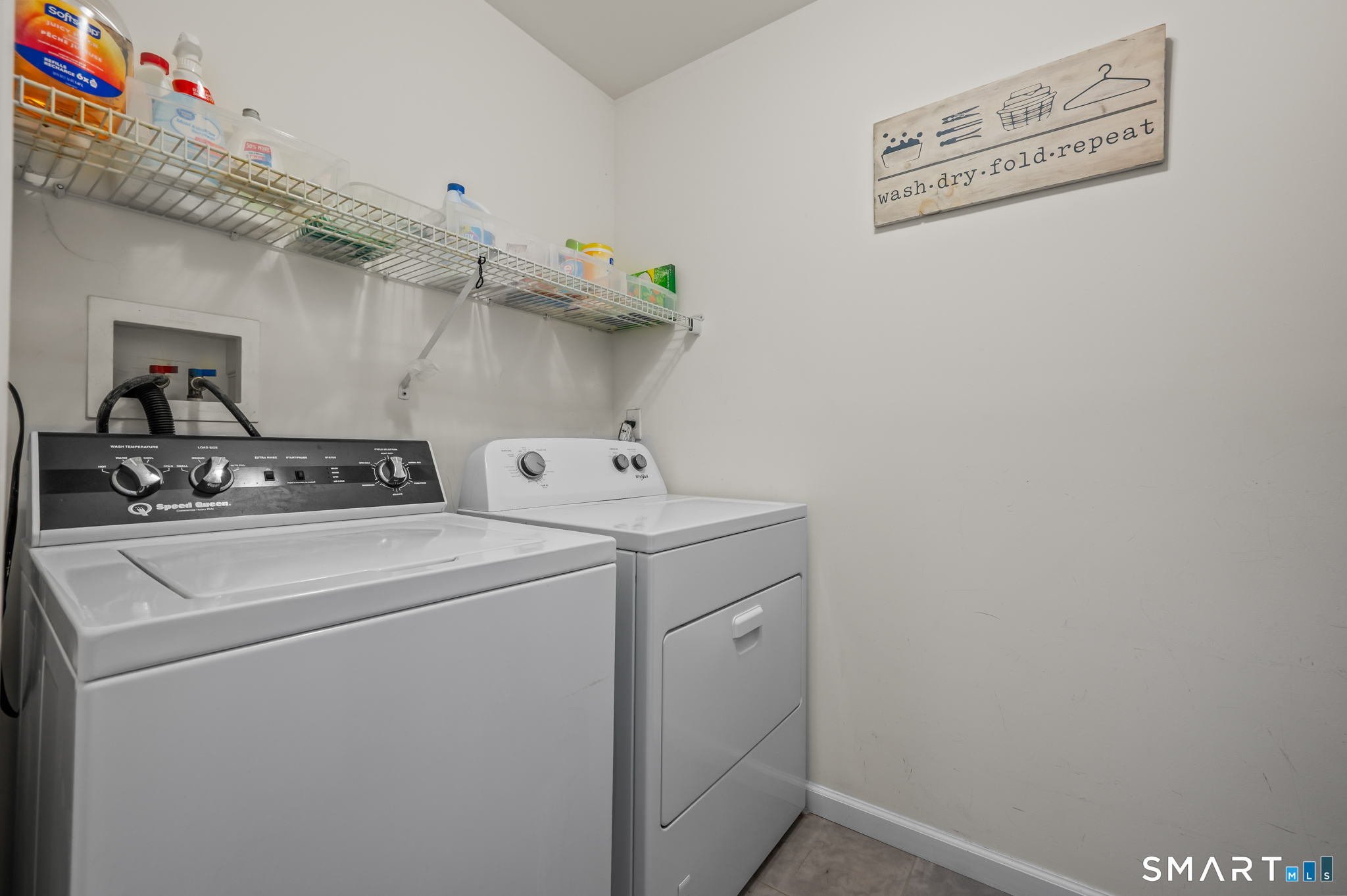 23 Rhodora Terrace, Unit 23 Windsor, CT 06095 - Photo 21 of 36 Laundry on upper level at top of stairs between the two bedrooms.