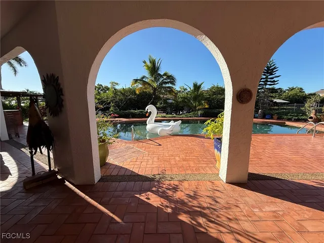 a view of a house with swimming pool