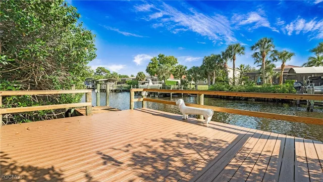 a view of a swimming pool with a lake view
