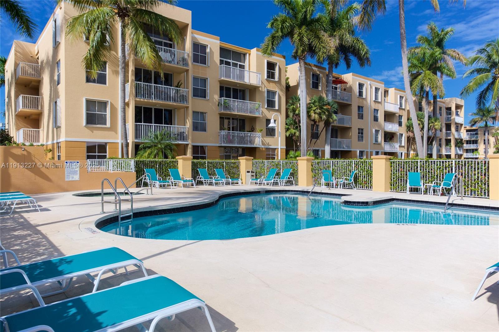 1350 Southeast 3rd Avenue, Unit 404 Dania Beach, FL 33004 - Photo 2 of 26 a view of swimming pool with outdoor seating