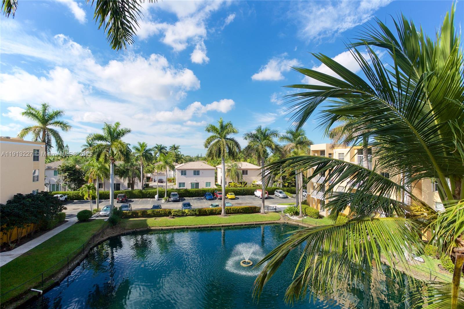 1350 Southeast 3rd Avenue, Unit 404 Dania Beach, FL 33004 - Photo 23 of 26 a view of swimming pool with outdoor seating and plants
