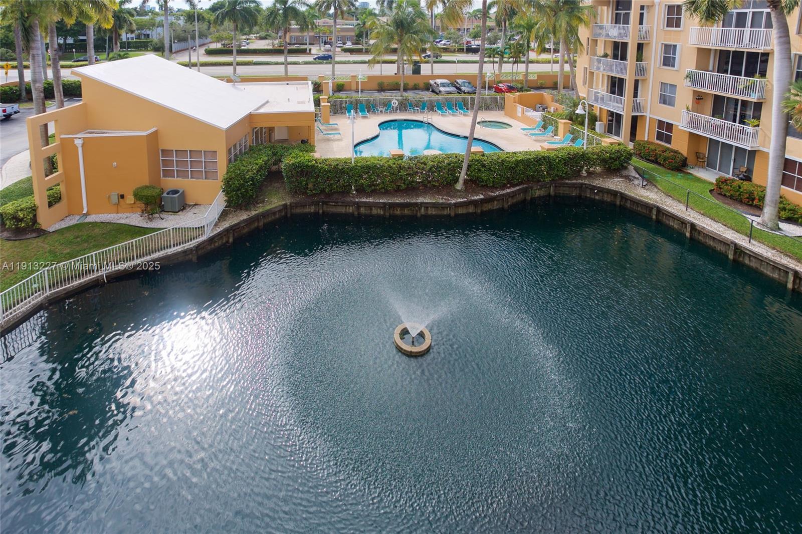 1350 Southeast 3rd Avenue, Unit 404 Dania Beach, FL 33004 - Photo 25 of 26 a view of swimming pool from a balcony