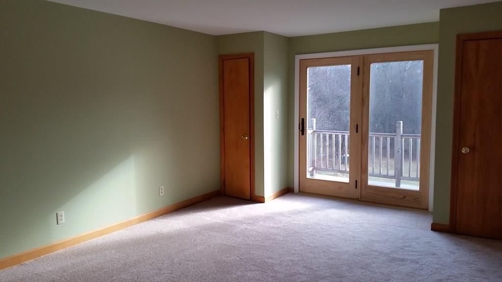 1300 Battle Ridge Road Clinton, ME 04927 - Photo 17 of 27 Master bedroom looking over backyard.