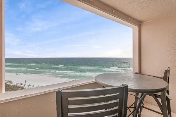 a view of a swimming pool and an ocean view