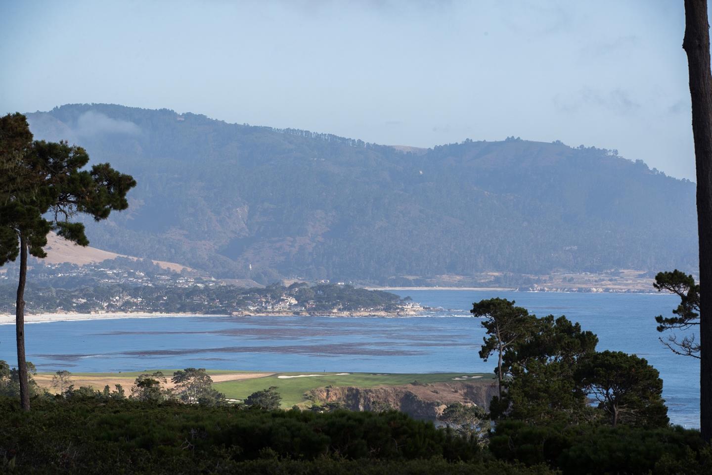 a view of ocean and mountains