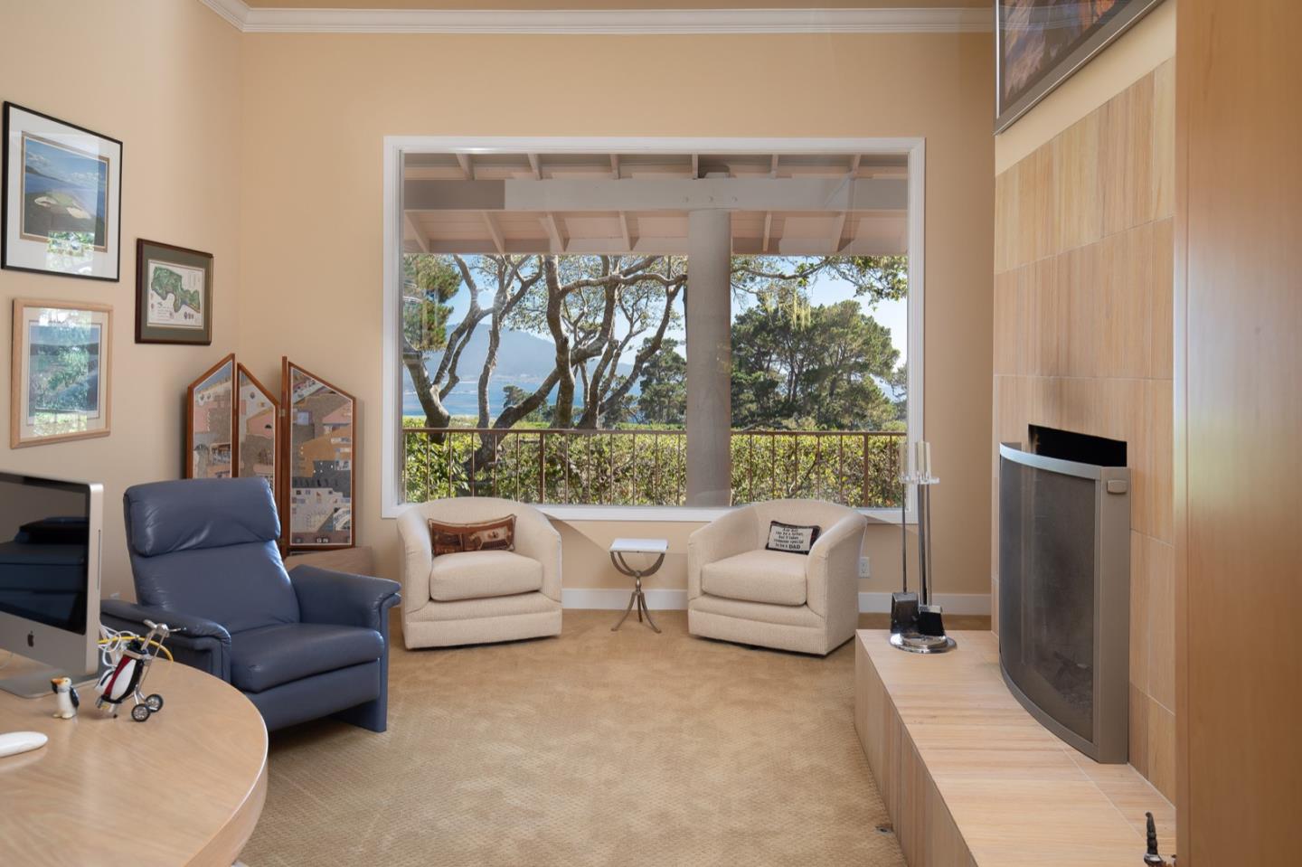 1477 Bonifacio Road Pebble Beach, CA 93953 - Photo 11 of 27 a living room with furniture and a large window