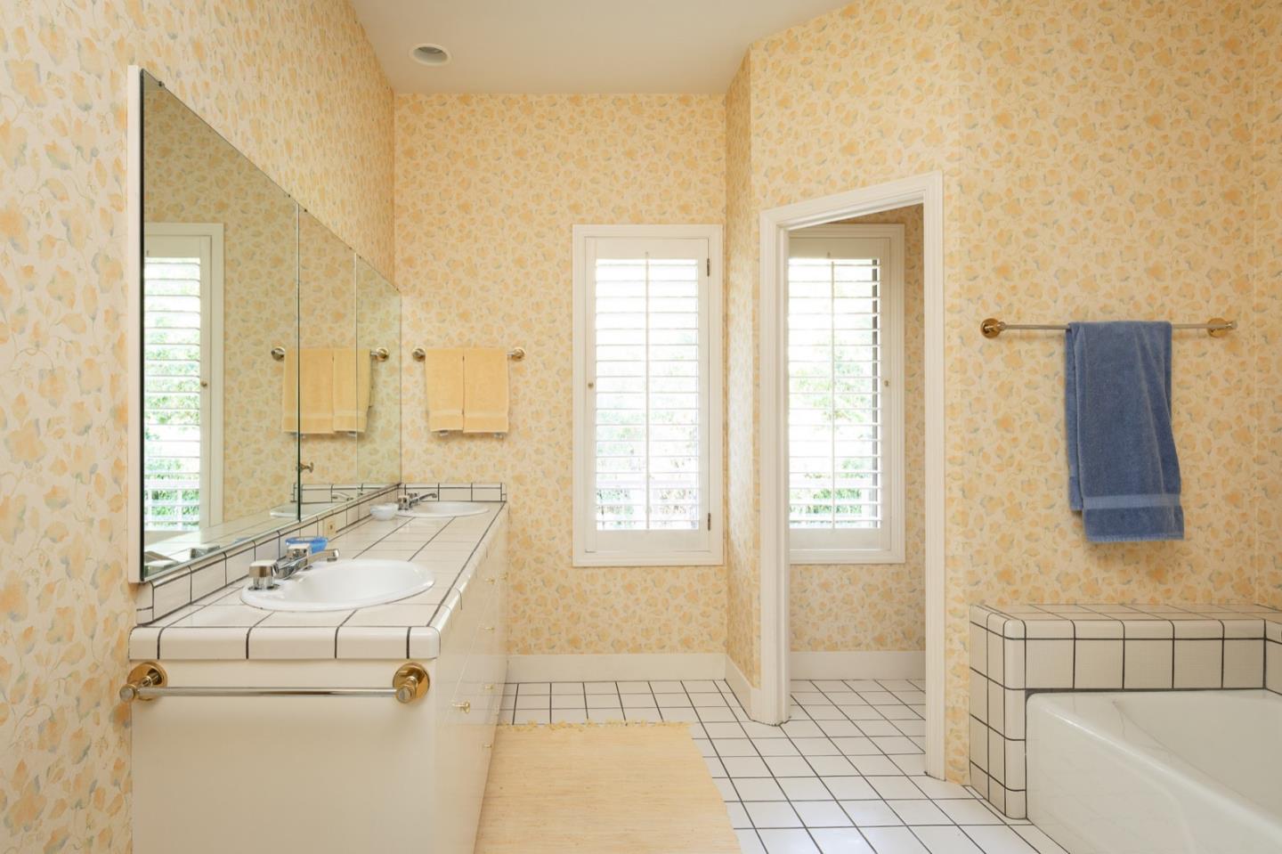 1477 Bonifacio Road Pebble Beach, CA 93953 - Photo 19 of 27 a bathroom with a sink a toilet and shower