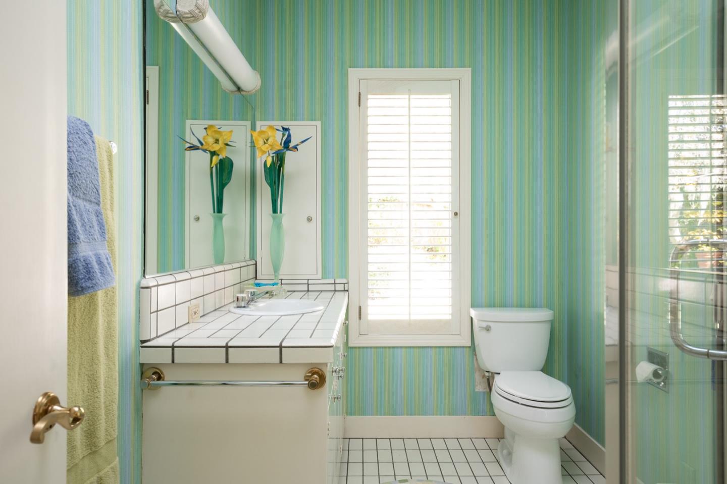 1477 Bonifacio Road Pebble Beach, CA 93953 - Photo 21 of 27 a bathroom with a sink a toilet and shower