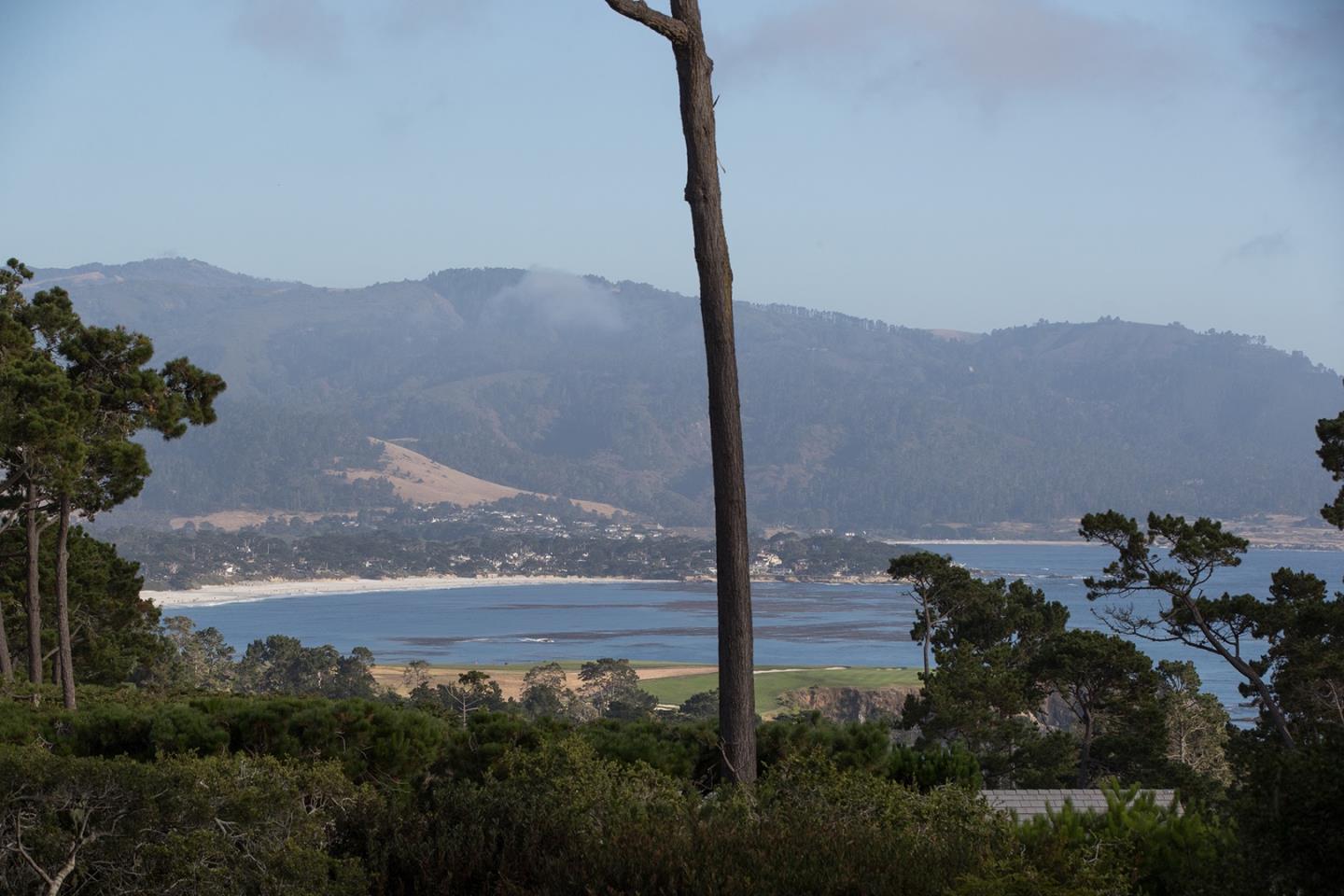 1477 Bonifacio Road Pebble Beach, CA 93953 - Photo 24 of 27 a view of a house with a mountain