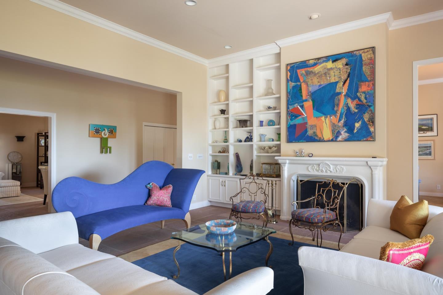 1477 Bonifacio Road Pebble Beach, CA 93953 - Photo 4 of 27 a living room with furniture couches and a fireplace
