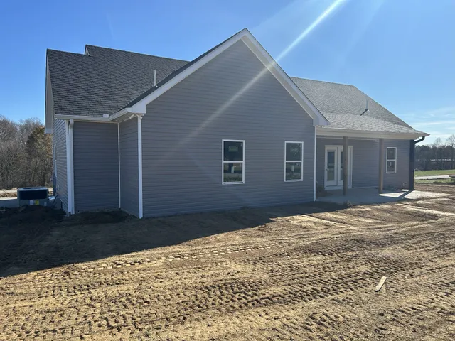a house view with a backyard
