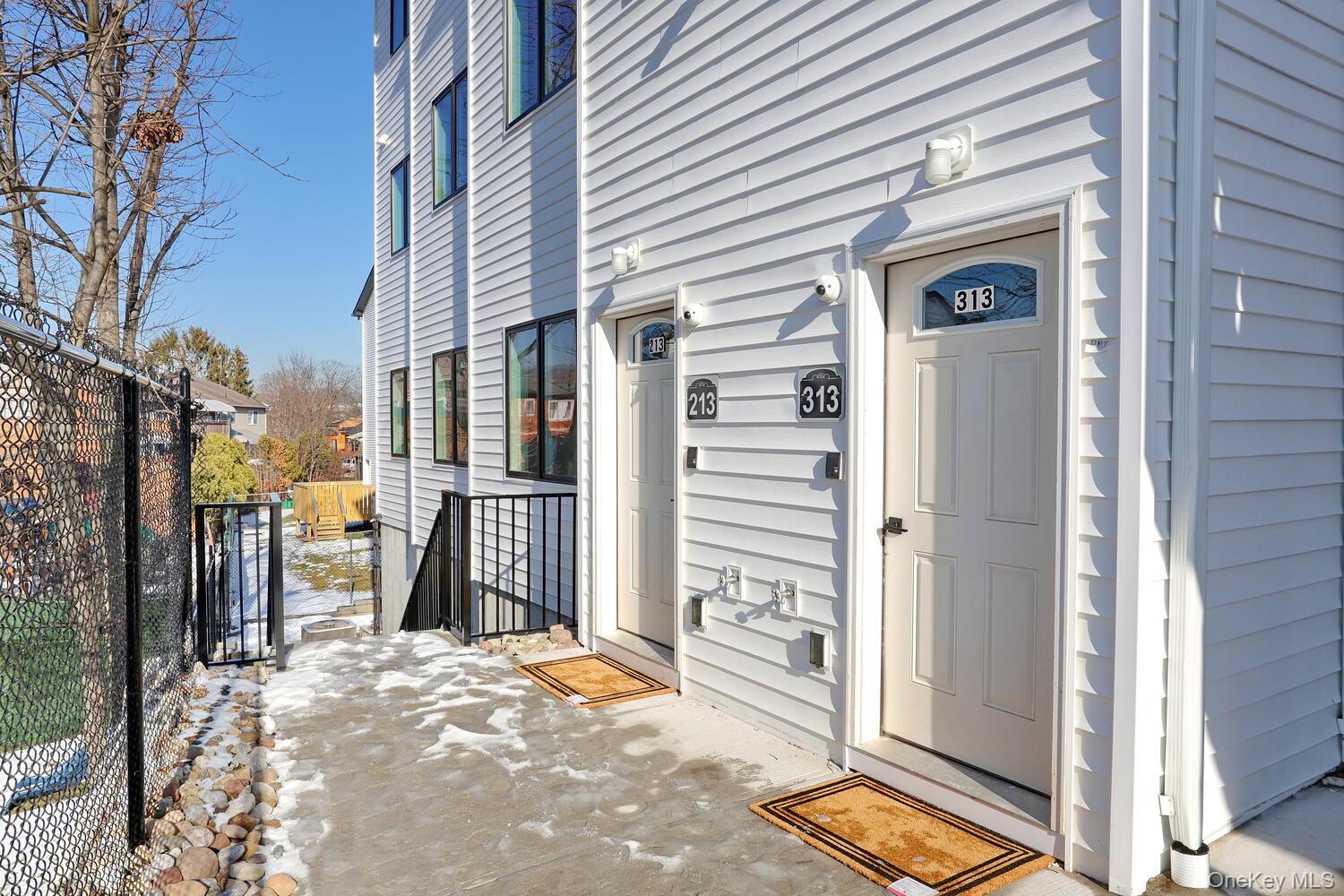 4 Howard Drive, Unit 213 Spring Valley, NY 10977 - Photo 2 of 42 a view of a house with a outdoor space
