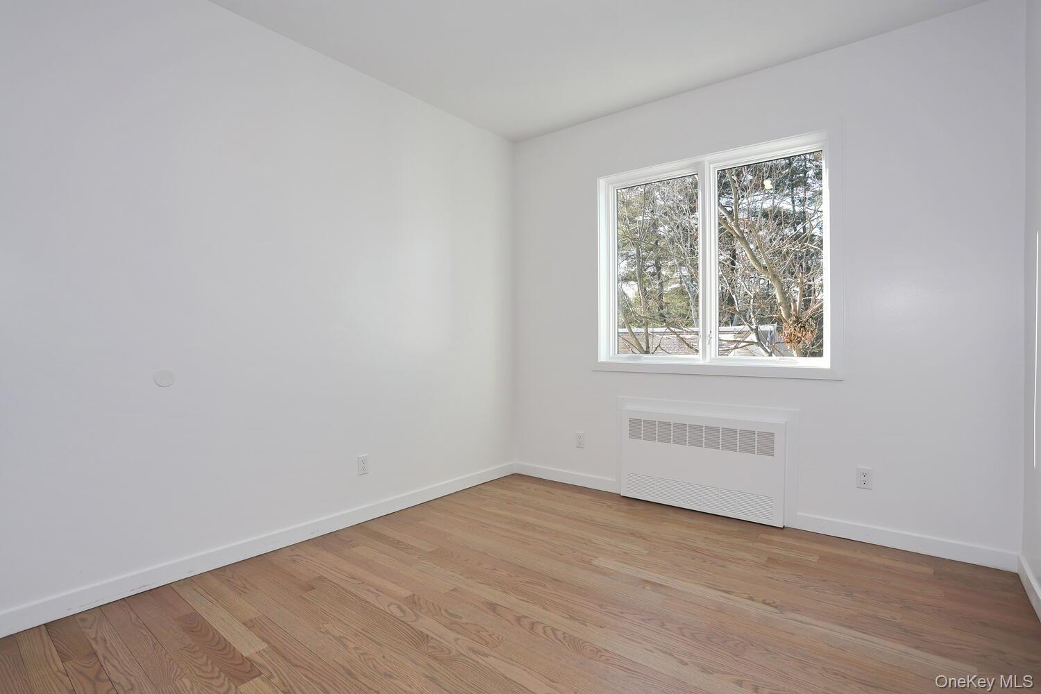 4 Howard Drive, Unit 213 Spring Valley, NY 10977 - Photo 30 of 42 an empty room with a window