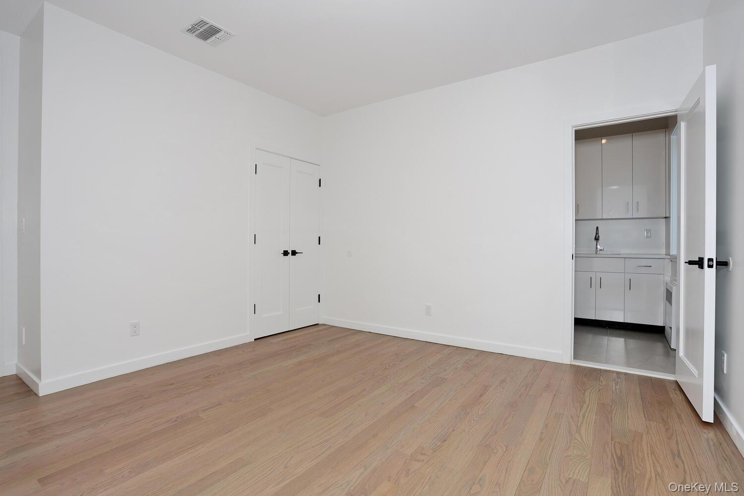 4 Howard Drive, Unit 213 Spring Valley, NY 10977 - Photo 38 of 42 a view of an empty room and window