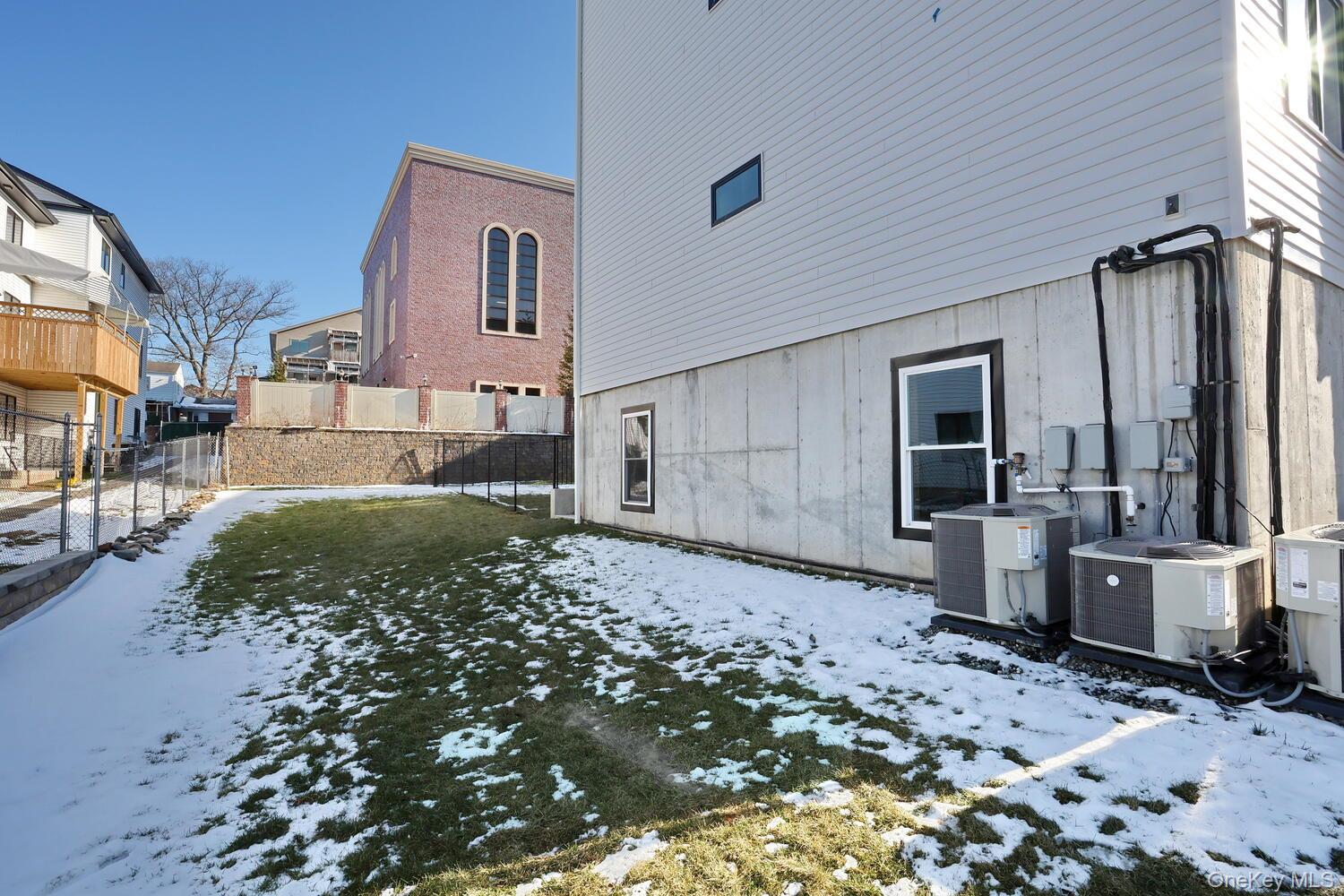4 Howard Drive, Unit 213 Spring Valley, NY 10977 - Photo 41 of 42 a front view of a house with garden