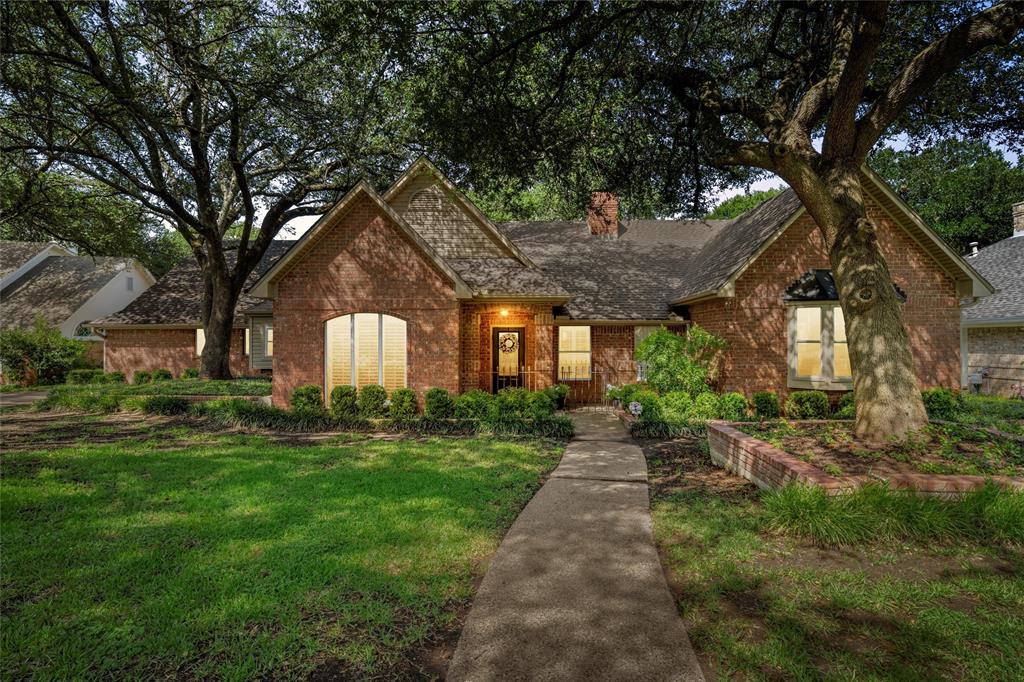 3000 Chimney Hill Drive Waco, TX 76708 - Photo 2 of 37 a backyard of a house with fountain table and chairs