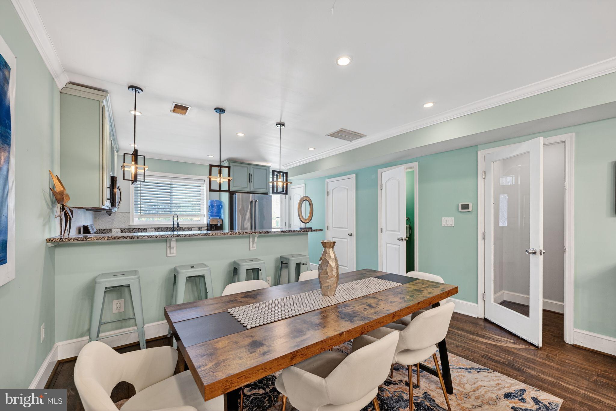 Charming dining area with modern accents.