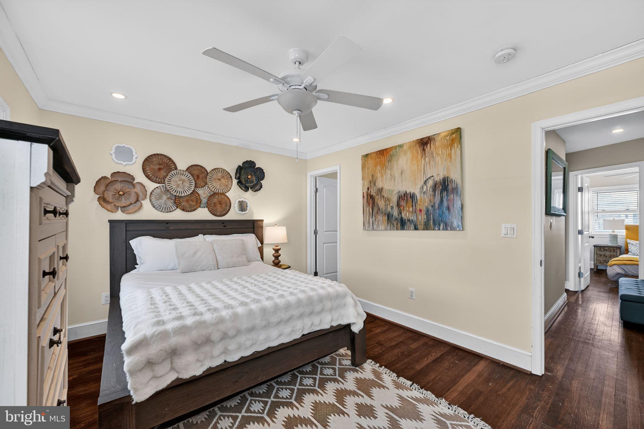 522 21st Street Northeast Washington, DC 20002 - Photo 13 of 29 Serene bedroom with artistic wall decor.