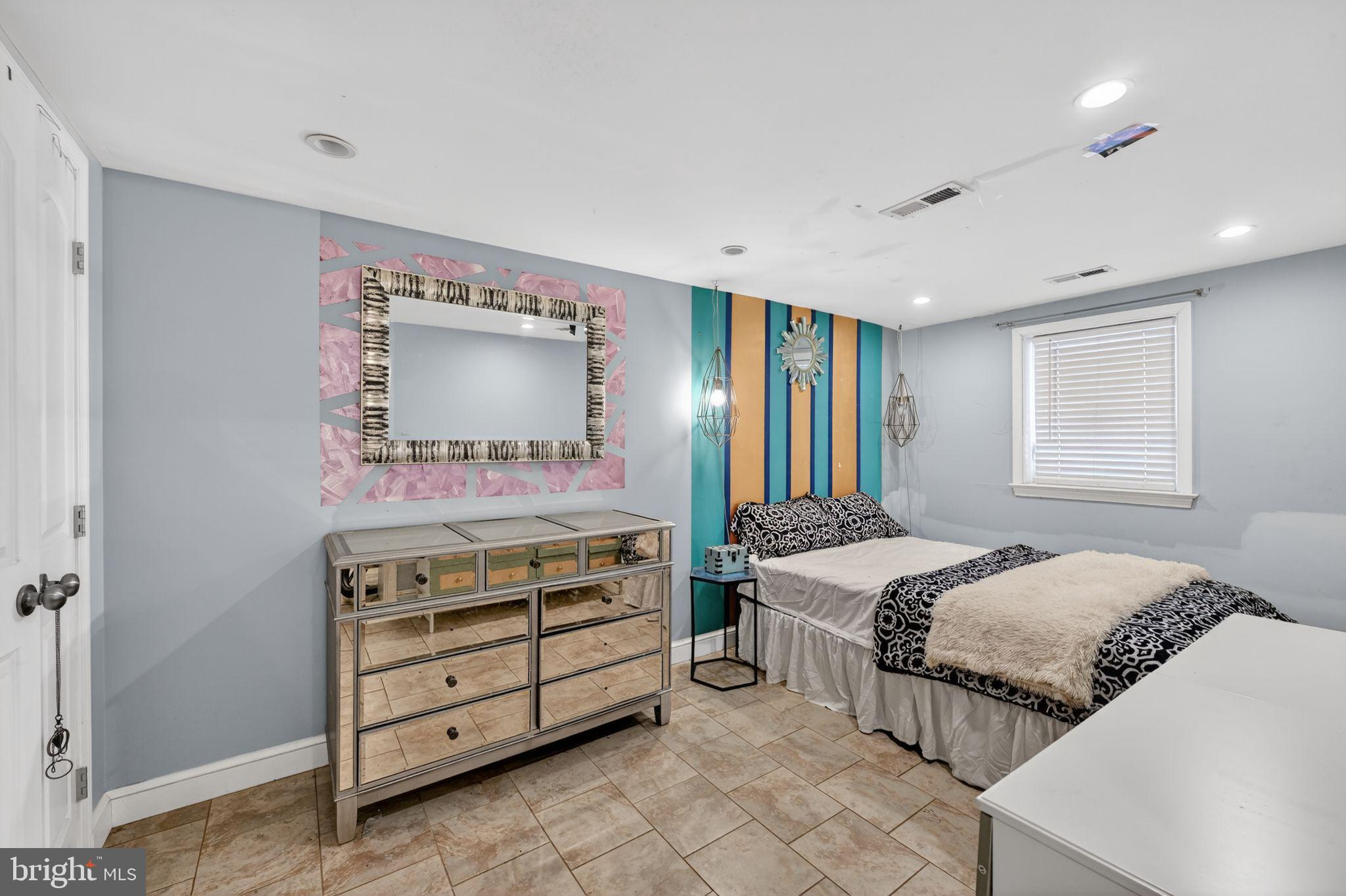 522 21st Street Northeast Washington, DC 20002 - Photo 21 of 29 Charming bedroom with vibrant accent wall.