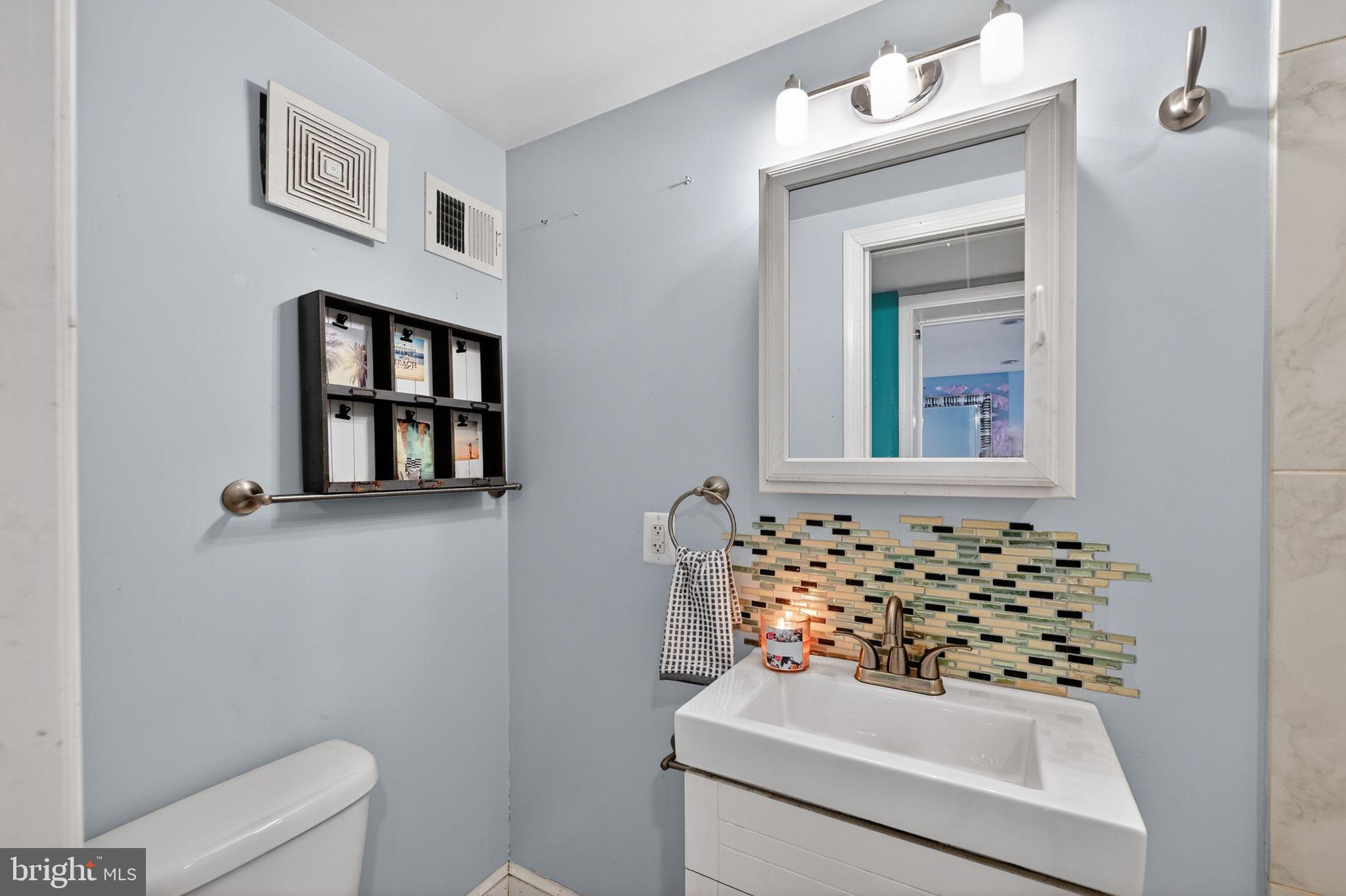 522 21st Street Northeast Washington, DC 20002 - Photo 24 of 29 Charming bathroom with modern accents.