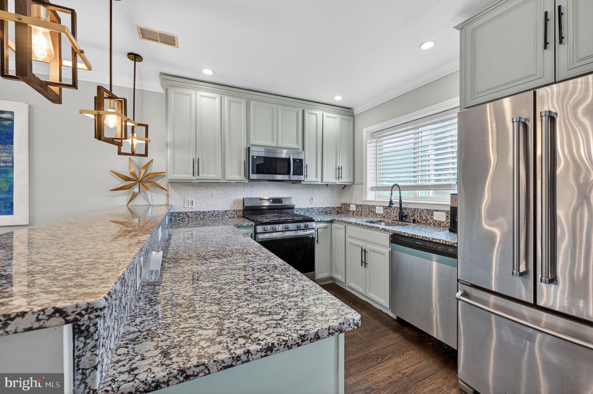 522 21st Street Northeast Washington, DC 20002 - Photo 7 of 29 Modern kitchen with sleek finishes.