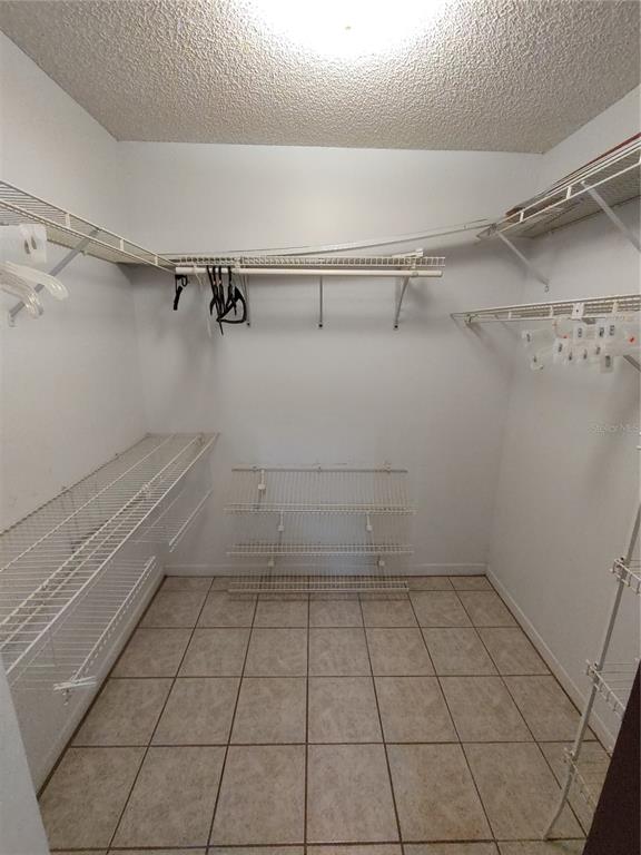 8565 Southwest 109th Street Ocala, FL 34481 - Photo 16 of 27 a view of a room with racks on the wall