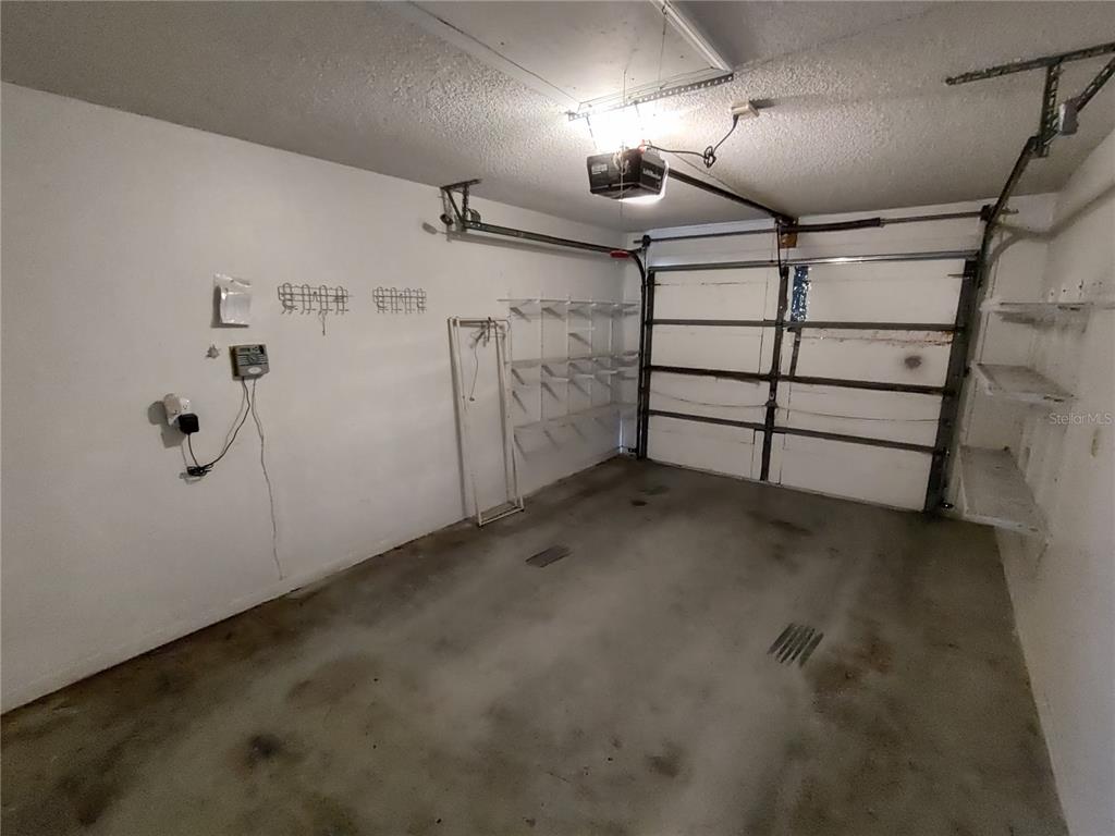 8565 Southwest 109th Street Ocala, FL 34481 - Photo 24 of 27 a view of a garage