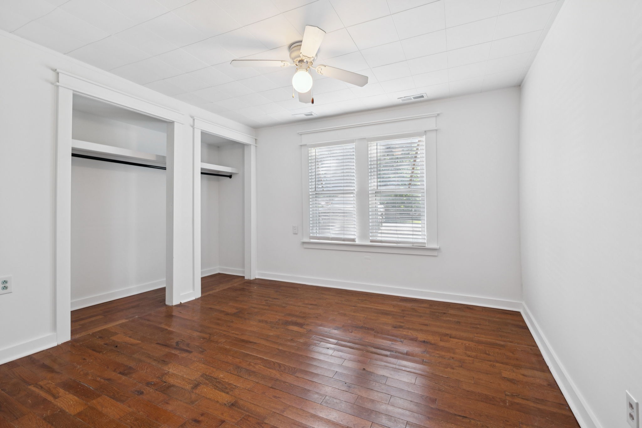 1008 Bales Street Gallatin, TN 37066 - Photo 11 of 19 wooden floor in an empty room with a window