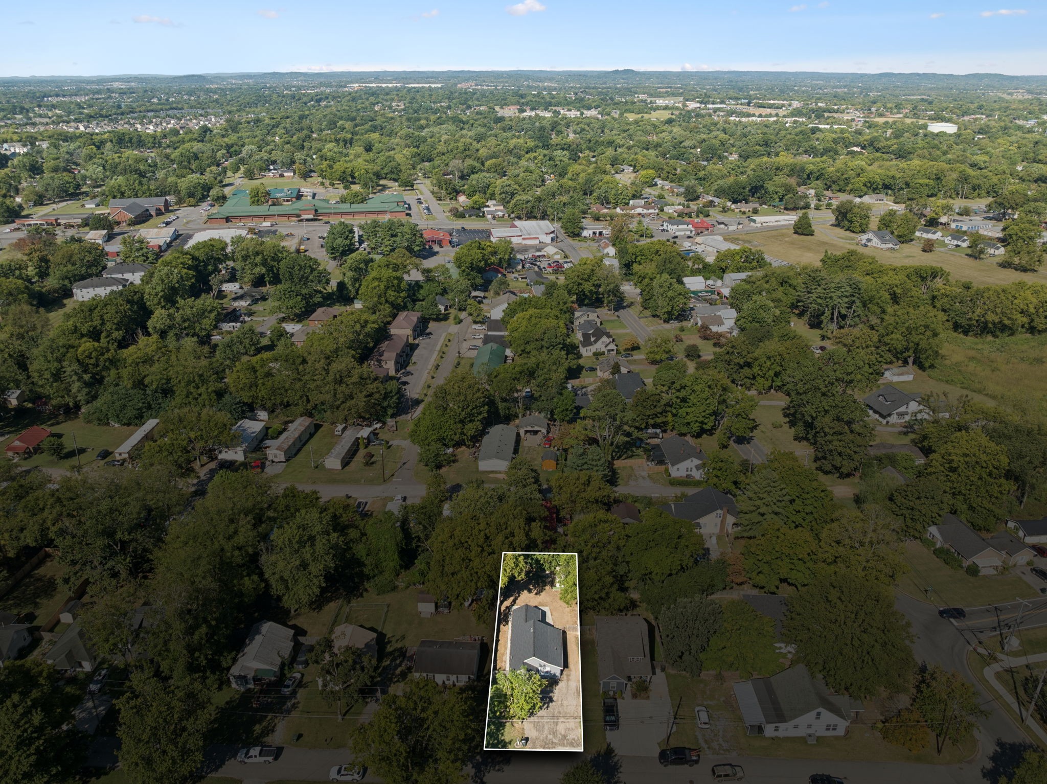 1008 Bales Street Gallatin, TN 37066 - Photo 12 of 19 an aerial view of a house with a yard