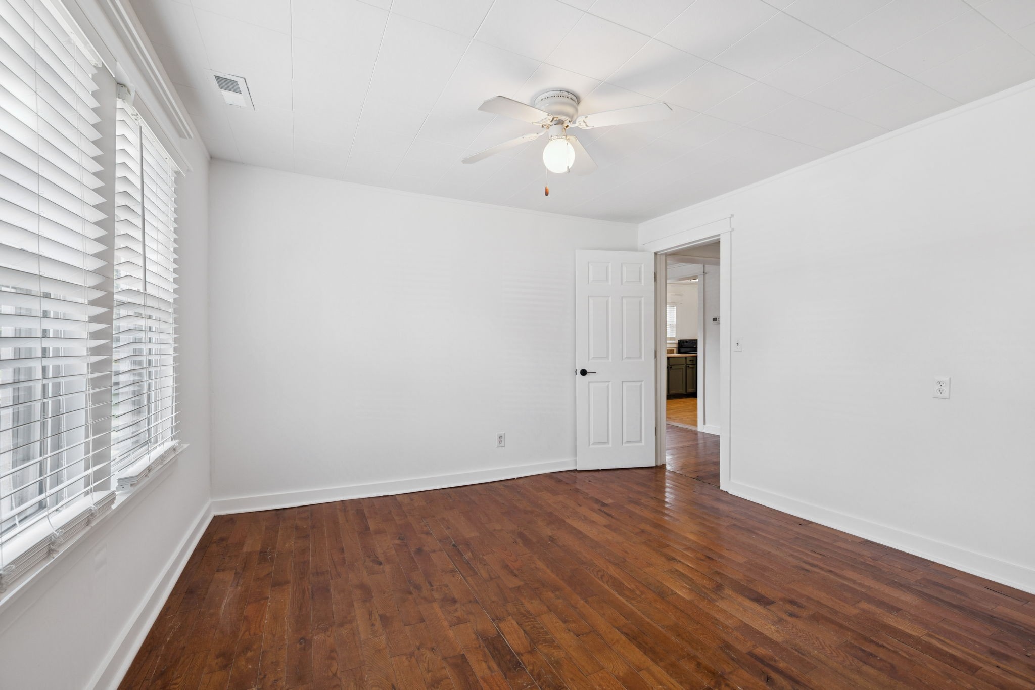 1008 Bales Street Gallatin, TN 37066 - Photo 15 of 19 wooden floor in an empty room with a window