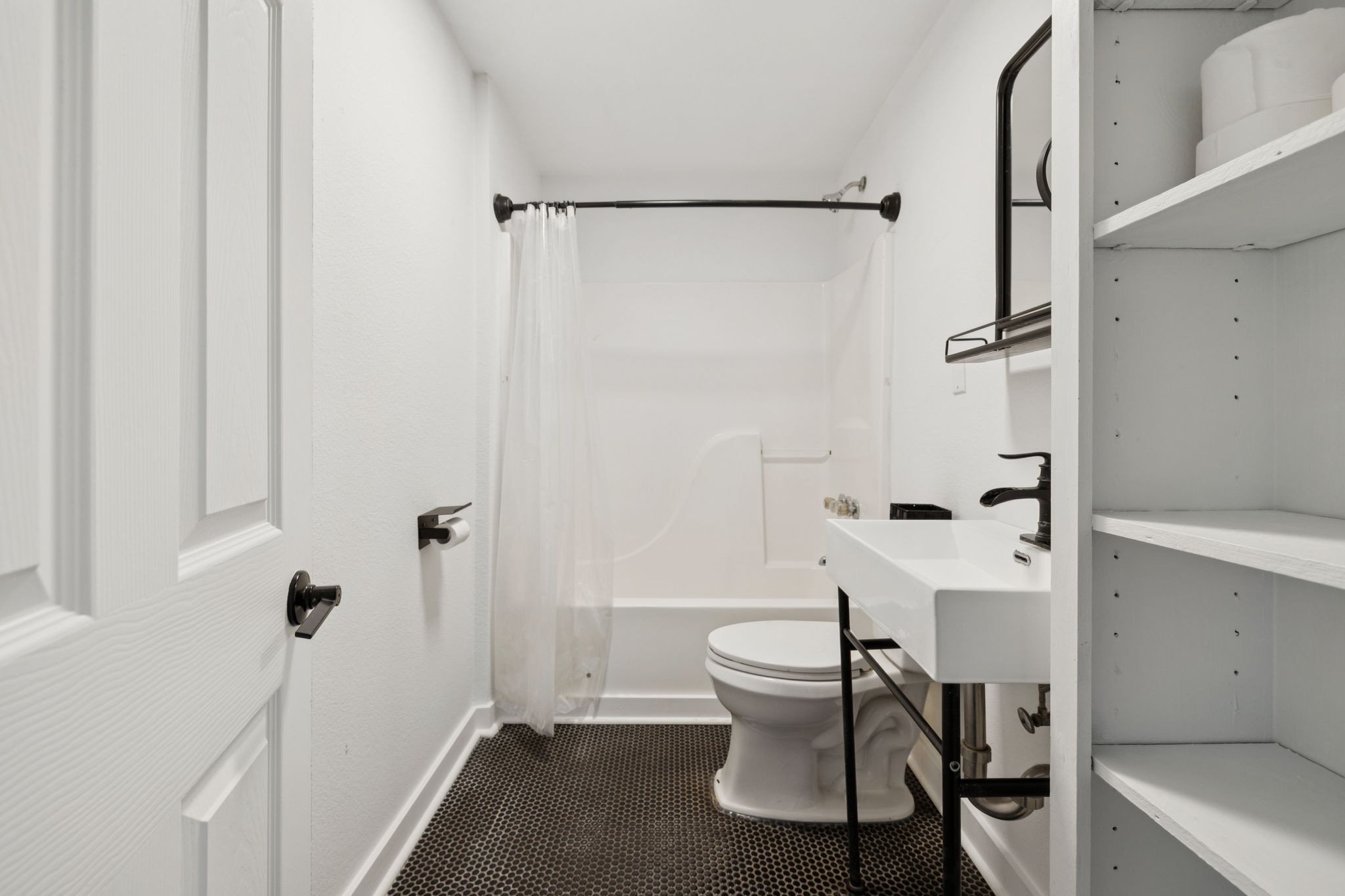 1008 Bales Street Gallatin, TN 37066 - Photo 9 of 19 a bathroom with a sink toilet and shower