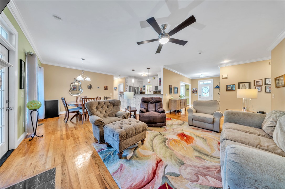 648 Mountain View Road Williamston, SC 29697 - Photo 5 of 42 Hardwood floors and an open concept create a seamless flow from the living area to the kitchen.