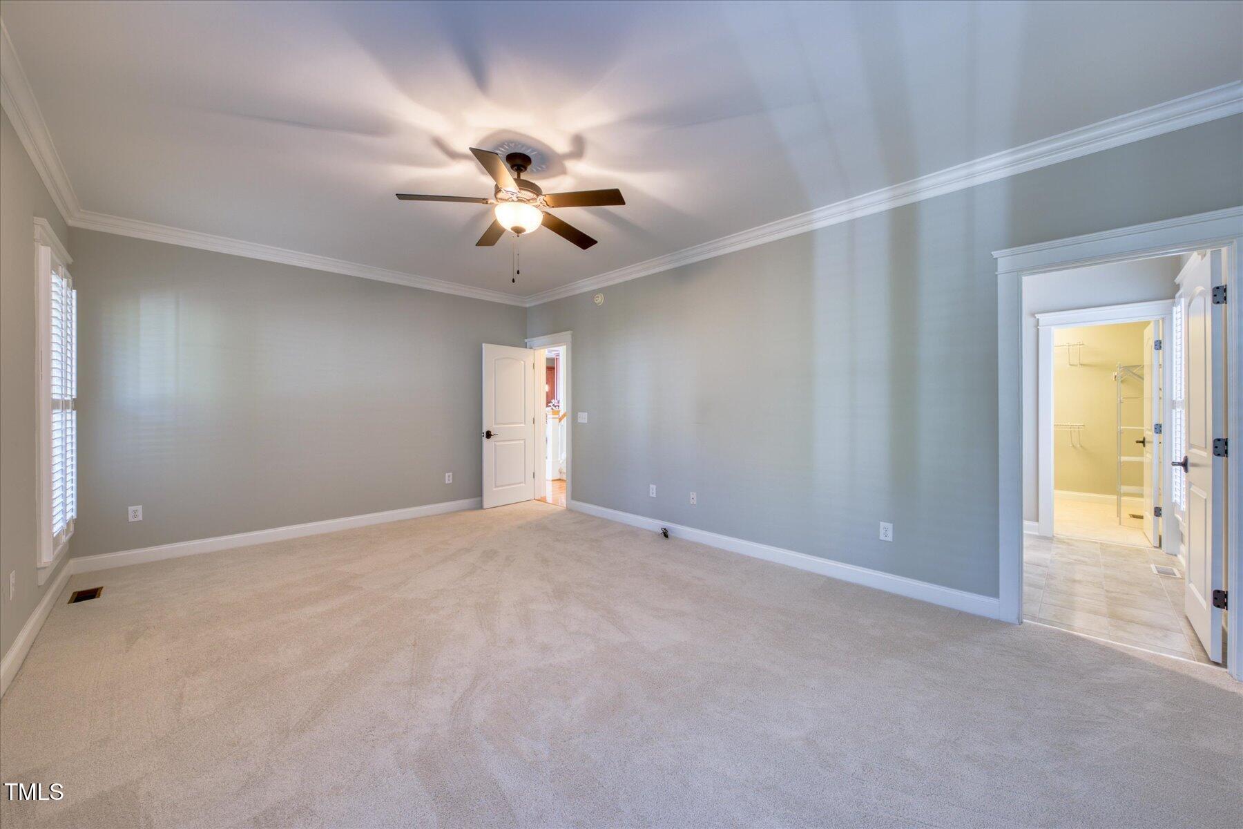 121 Bridgegate Drive Cary, NC 27519 - Photo 15 of 38 a view of an empty room with a window