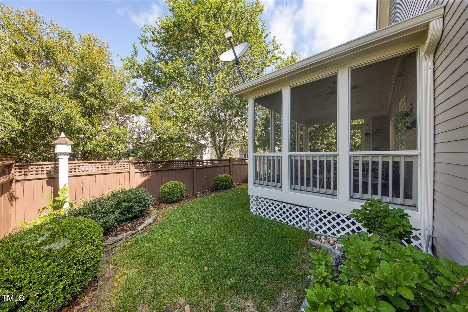 121 Bridgegate Drive Cary, NC 27519 - Photo 29 of 38 a view of a chair and table in the back yard