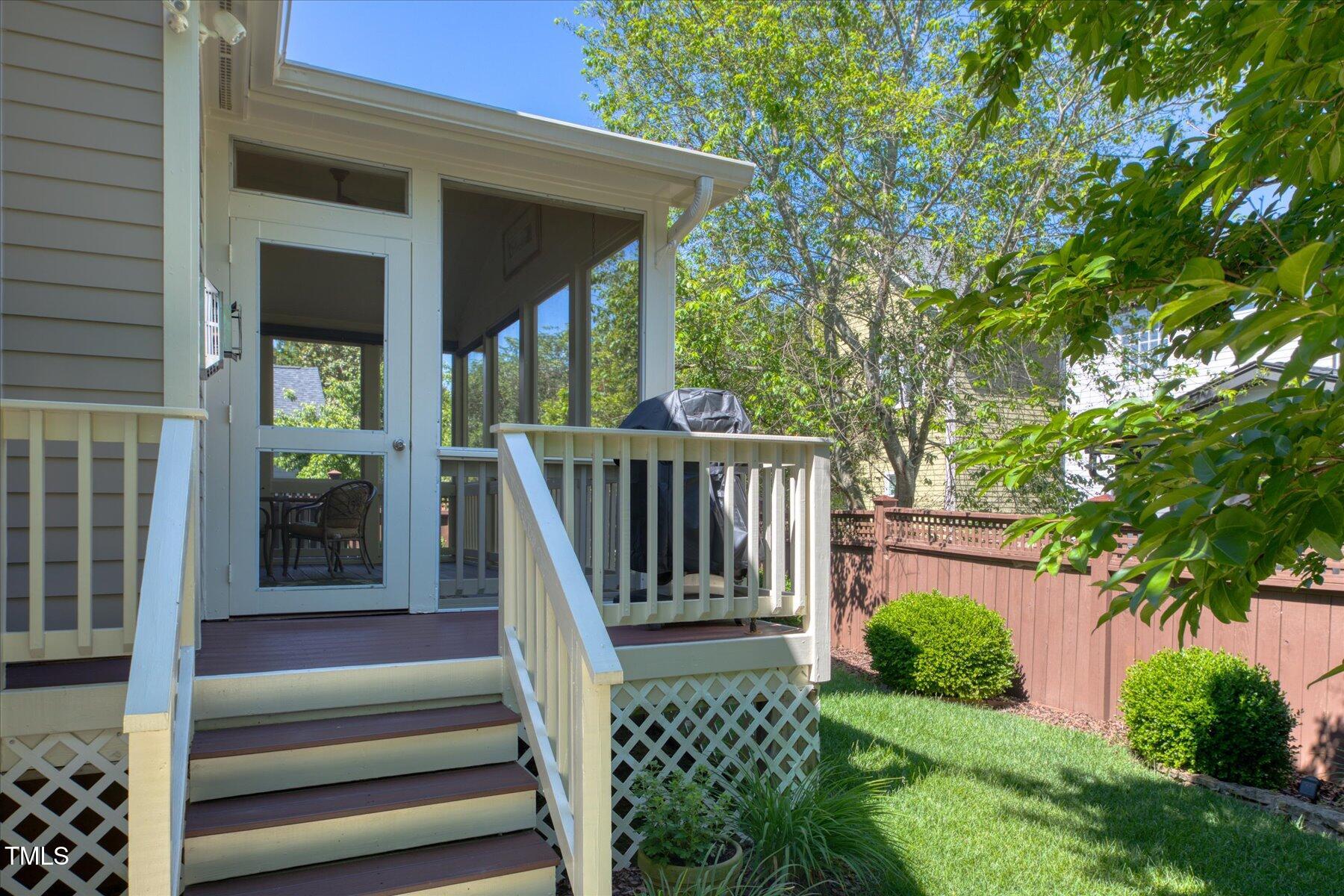 121 Bridgegate Drive Cary, NC 27519 - Photo 30 of 38 a view of a wooden door and a yard