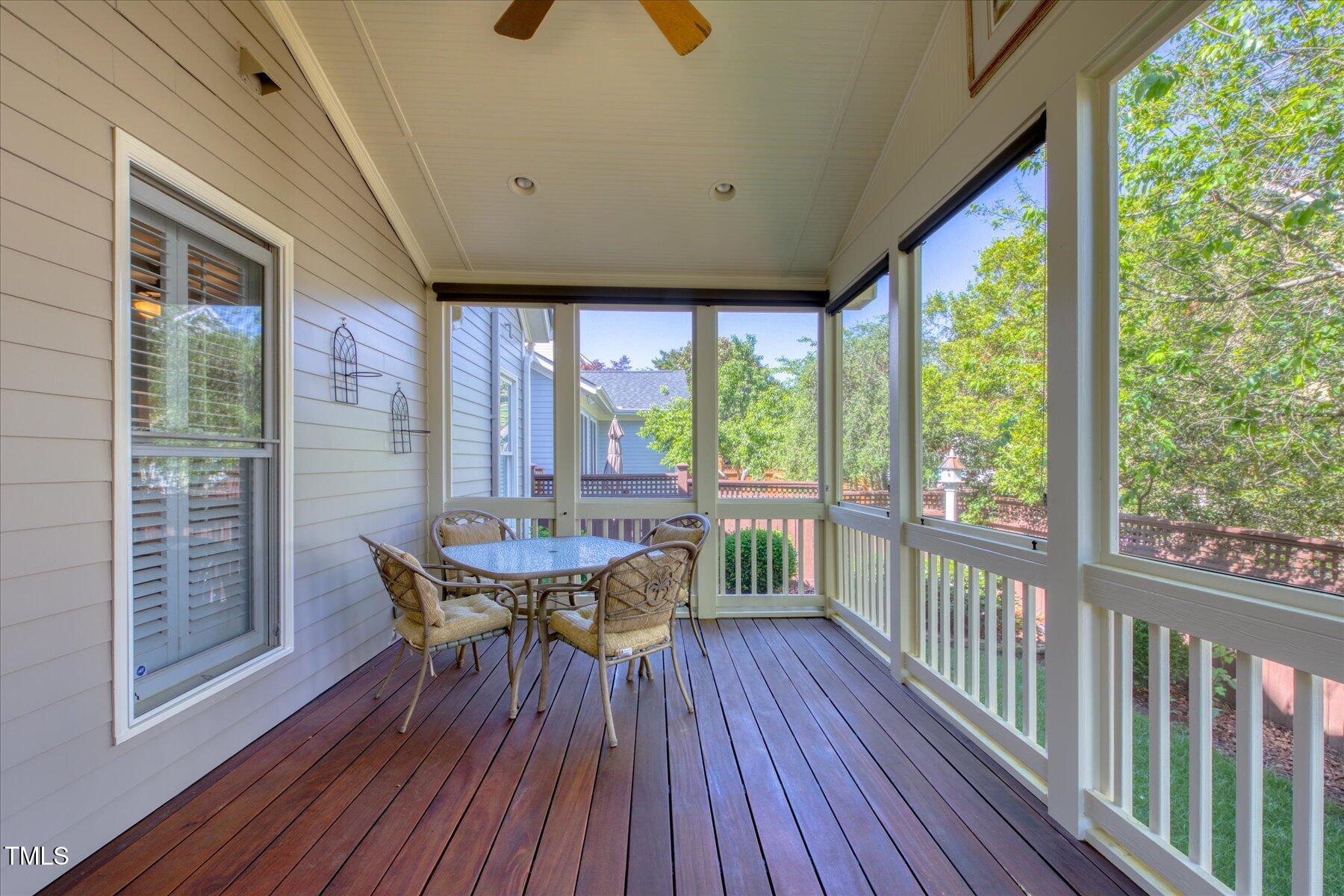 121 Bridgegate Drive Cary, NC 27519 - Photo 31 of 38 a view of a dining room with furniture window and wooden floor