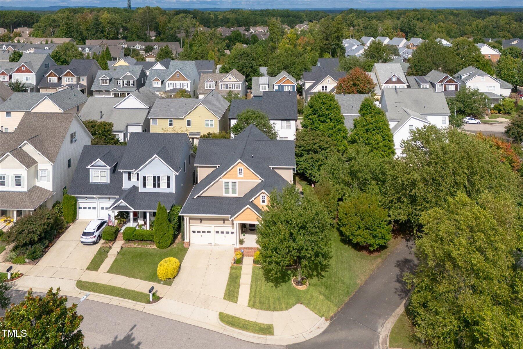 121 Bridgegate Drive Cary, NC 27519 - Photo 33 of 38 an aerial view of residential houses with outdoor space and street view