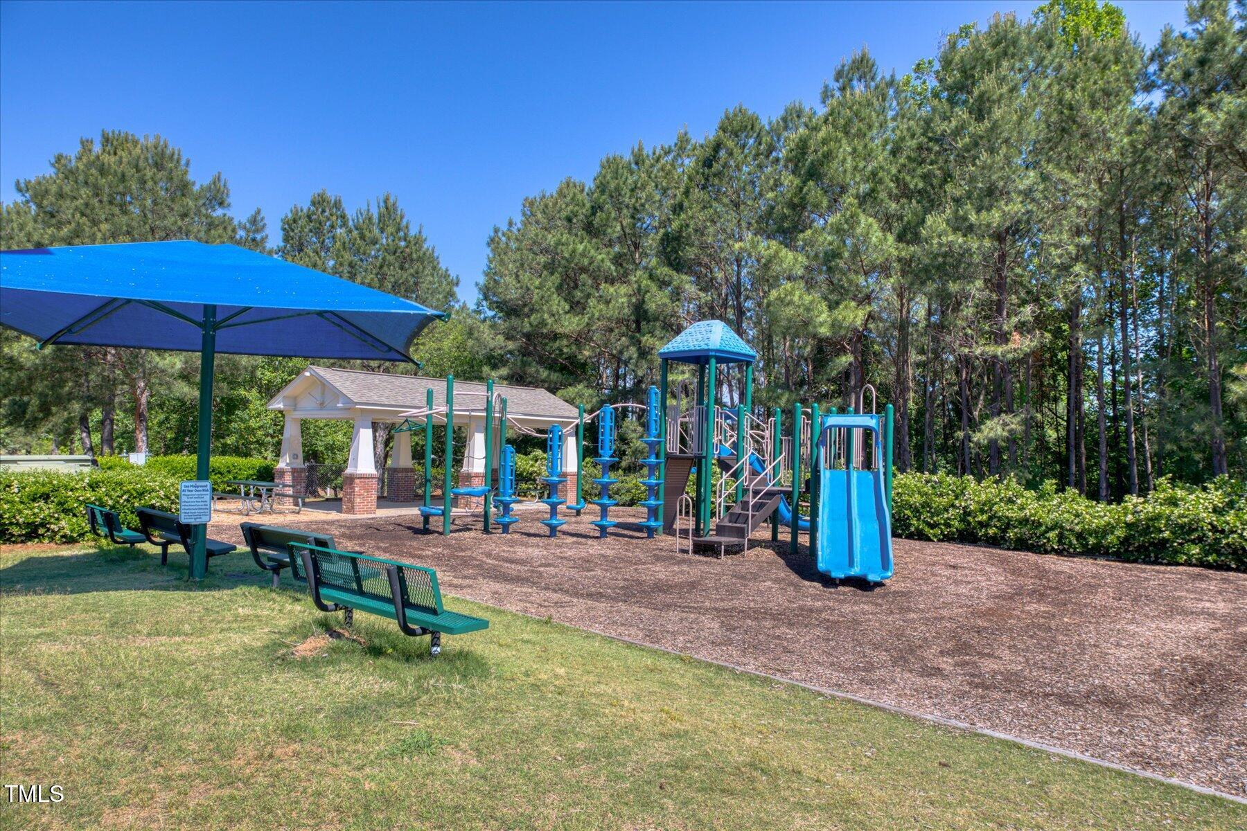 121 Bridgegate Drive Cary, NC 27519 - Photo 34 of 38 a view of a park with sitting area and furniture
