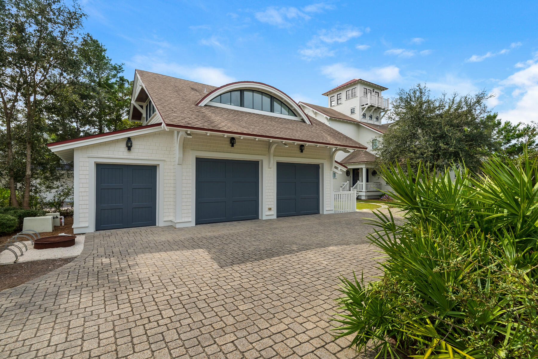 44 Bridge Water Ln Inlet Beach Inlet Beach, FL 32461 - Photo 2 of 83 a front view of a house with a yard and garage
