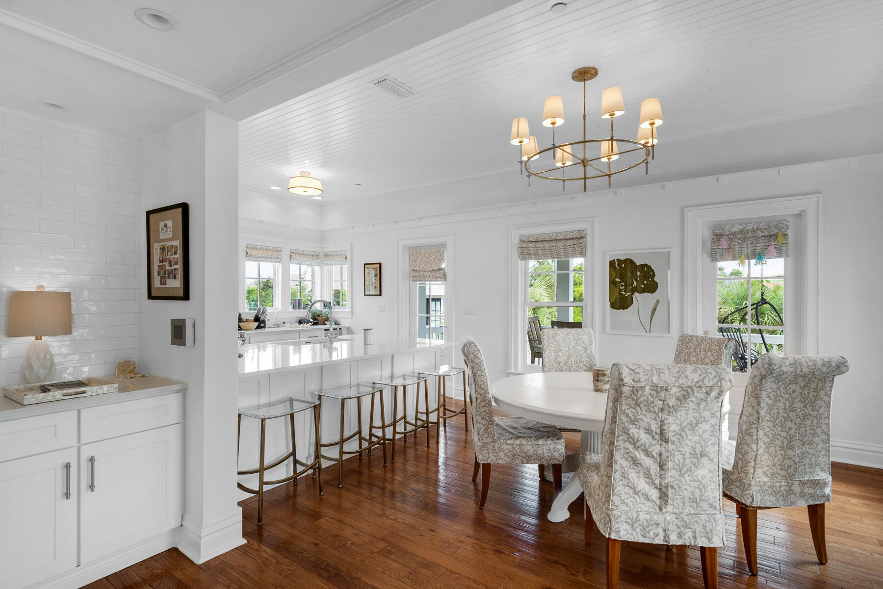 44 Bridge Water Ln Inlet Beach Inlet Beach, FL 32461 - Photo 43 of 83 a view of a dining room with furniture a chandelier and wooden floor