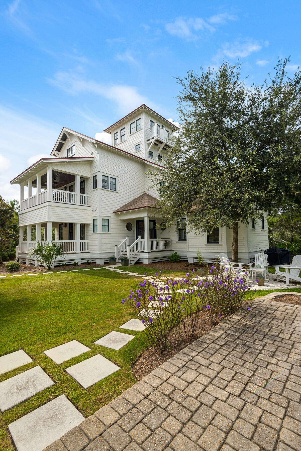 44 Bridge Water Ln Inlet Beach Inlet Beach, FL 32461 - Photo 6 of 83 a front view of a house with a garden