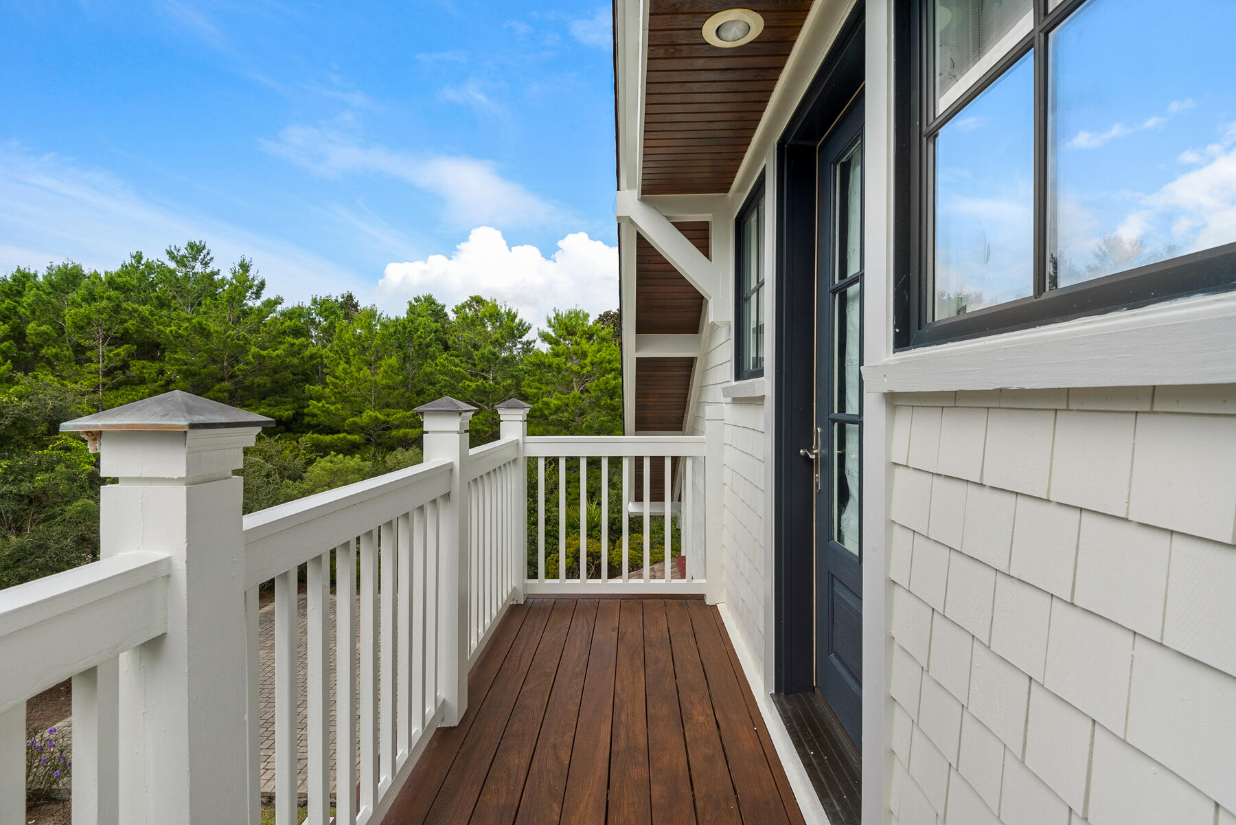 44 Bridge Water Ln Inlet Beach Inlet Beach, FL 32461 - Photo 75 of 83 a view of balcony with wooden floor and fence