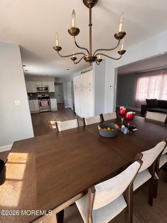 a view of a dining room with furniture