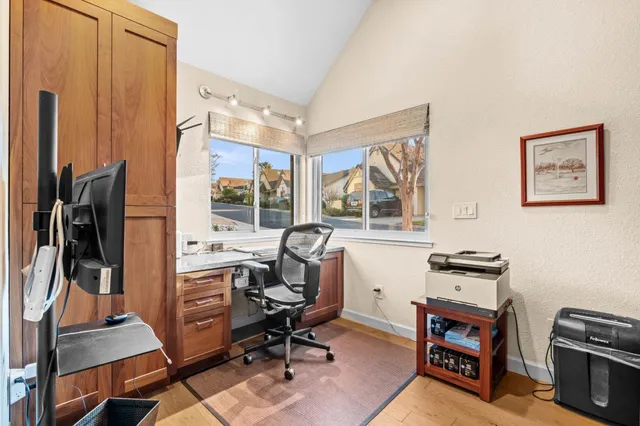 a view of a workspace with furniture