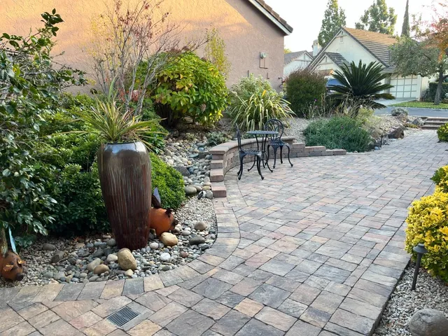 a front view of a house with outdoor seating