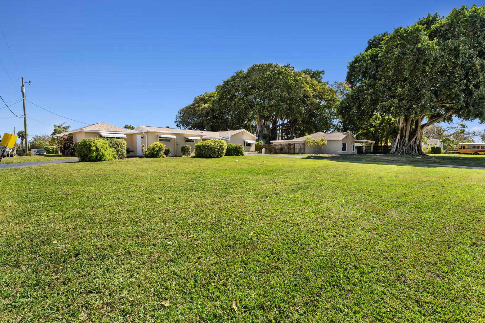 1812 High Ridge Road Lake Worth, FL 33461 - Photo 40 of 43 Front