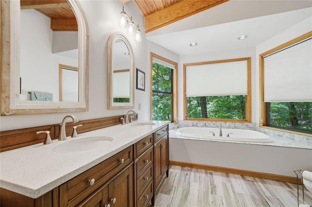 251 Panorama Point Jasper, GA 30143 - Photo 18 of 93 a bathroom with a sink and a large window